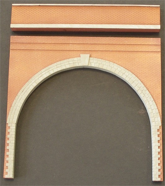Narrow, high brick arch & separate parapet. UNPAINTED