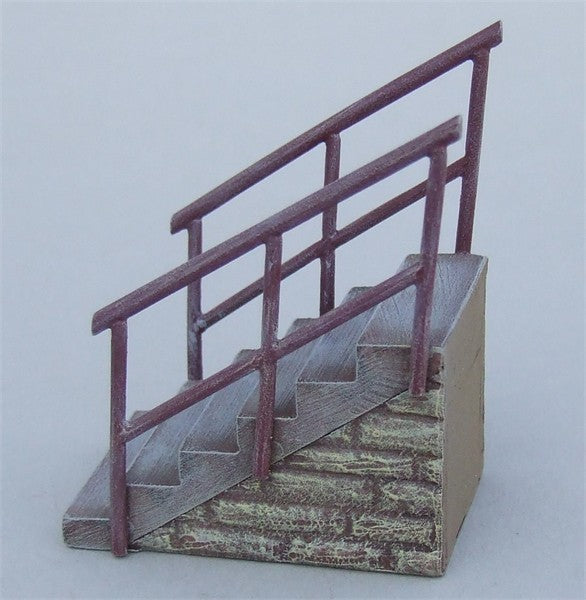 Wide stone steps with handrails